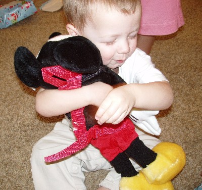 Hayden loving up one of his Christmas presents