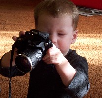 Hayden as photog, 26 months