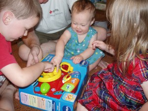 rachel with her car toy